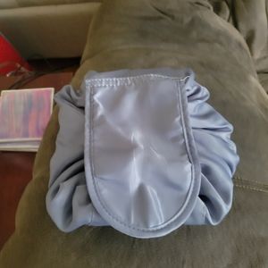 Light blue drawstring toiletry bag